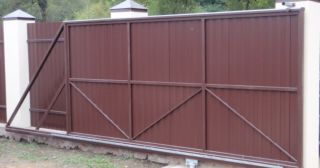 Купить откатные ворота из профнастила Абакан, цена от 1773 руб.
